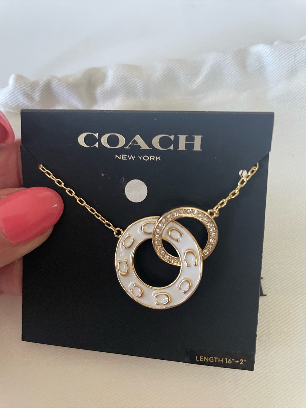 Coach Gold-Tone Necklace with White Enamel and Crystal Interlocking Circles
